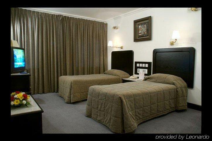 Grand Astoria Hotel Dubai Room photo
